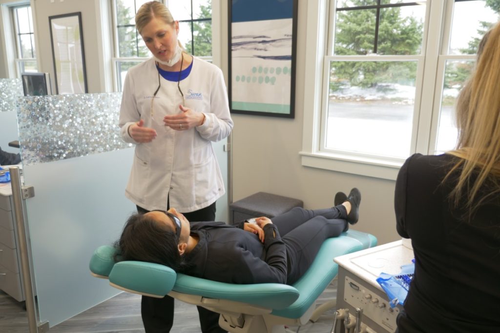 Swan dr with patient Swan Orthodontics