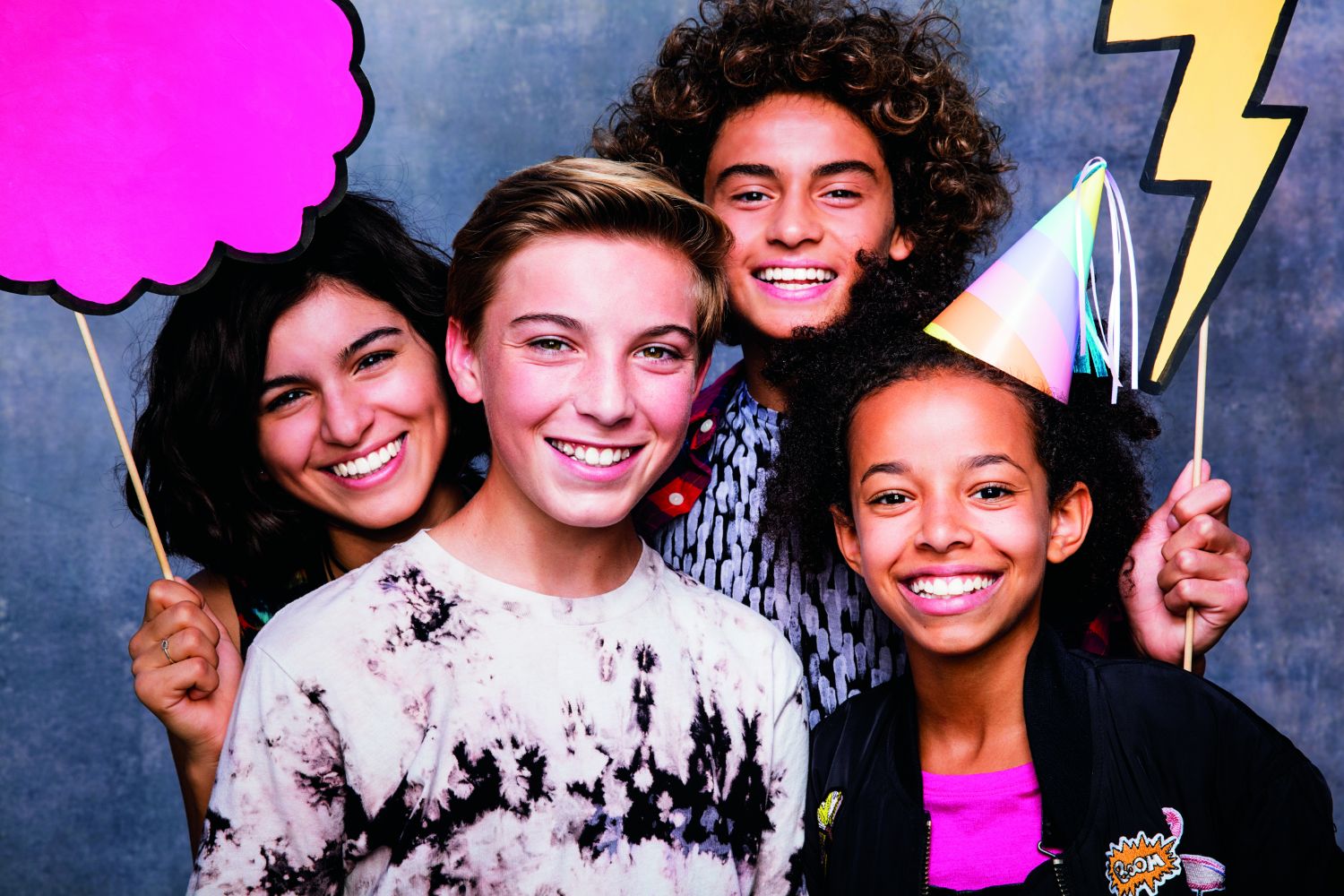 Teens with Invisalign at a photo booth